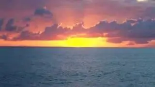 Sun Setting on Horizon