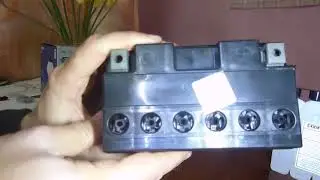 Filling an AGM battery with electrolyte