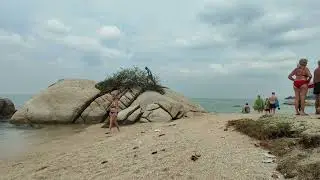 Walking on the beach of Nuklua west coast,Pattaya.