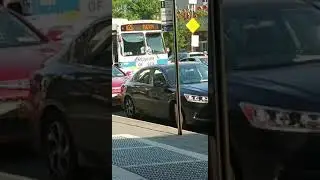 Orion VII HEV Original Generation B25 bus at Fulton St & Nostrand Ave (Nostrand Ave (A)(C) Station)