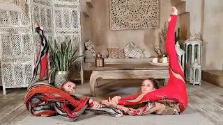 Contortion Duo. Acrobatics Performance in Photostudio. Flexible Circus Girls.