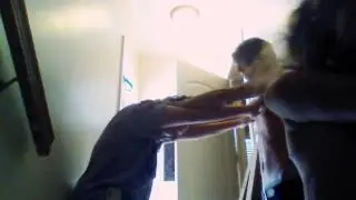 My brother and sister play fighting