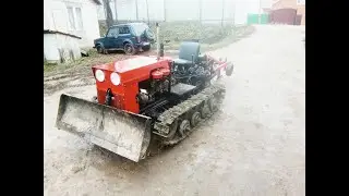 Homemade mini crawler tractor review of the MINI DOZER turning mechanism