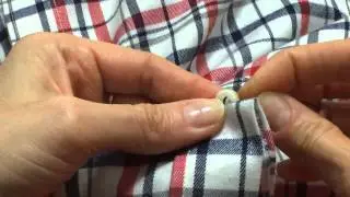 How to sew on a button using the Bird's Foot method