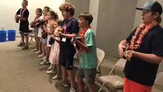 Ukulele lessons for kids at the Union County Heritage Museum