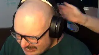 Bald man gets slapped...