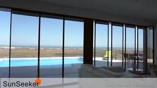 UltraSlim Bi Folding Doors, contemporary slide pivot & stack patio door system, made in England.