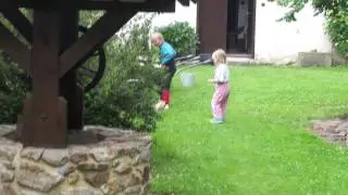 Oliver - pug playing with kids
