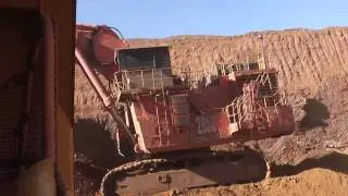 Hitachi 3600 Excavator loading a Komatsu 830E Dump Truck