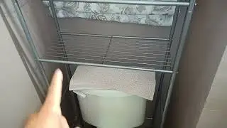 Bathroom over the toilet shelf 1