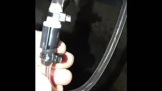 Replacing the rear window washer hose on a BMW X5 E70