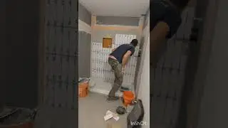 A little tile and a lot of butt crack 