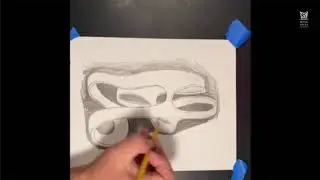 Lead Metal Sculpture Instructor Matt Smith creates a 3-D drawing