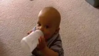 Baby drinking his bottle