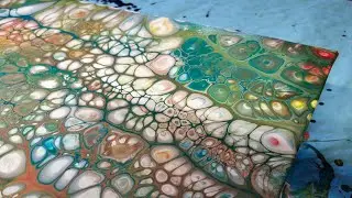 Metallic colors with gold create acrylic pouring