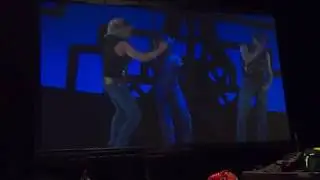 Sexy Cowboy Swinging Pole Act - Cirque Dreams