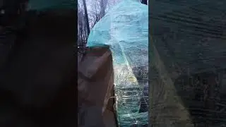 Skrink wrap shelter with stove