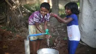 Playtime and Water on the Streets of India