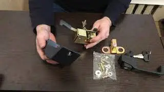Замок двери кабины МТЗ в сборе