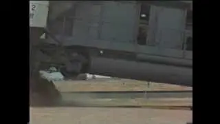 Inline Collision of a Freight Locomotive with a Stationary Hopper Consist