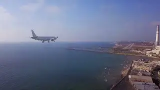 Guy with brain piercing films landing airplanes with Mavic from 86 meters at Tel Aviv Airport