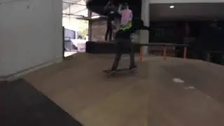 Skateboard trick big spin blunt at buqiet skatepark