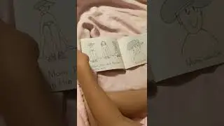 Симка учится читать на английском.