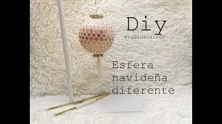 Esfera de navidad con guantes de red