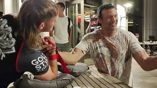 Party Devon teaching young Aussie how to get better at Armwrestling