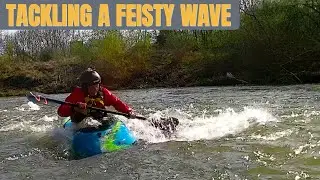 Tackling a feisty wave: Powick Weir , River Teme