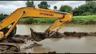 excavator working in mud