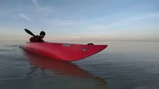 Maneuvering a sea kayak.