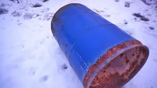 There was a metal barrel lying around on the property and I found a use for it.