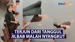 Viral !!! Cewe Terjun Dari Tanggul Jilbab Nyangkut Hingga Terlepas