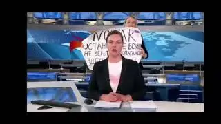 The girl's name is Maria Ovsyanikova, an employee at Channel 1;  russian finish