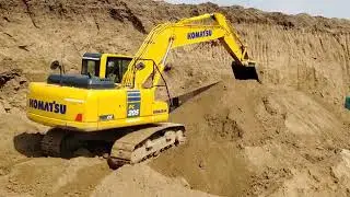Komatsu PC205-10 and Kobelco SK220 working at Same frame..