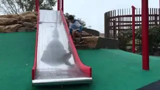 Playing in the rain at the park