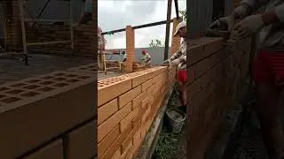 Коллективная работа строителей. Teamwork of builders.