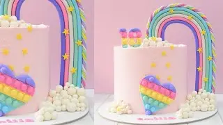 PASTEL DE POP IT Y ARCOÍRIS | Fiorella Cake