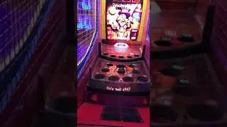 ICE Milk jug toss ball machine arcade machine. (Old video.)
