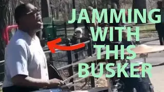 Making music on top of this awesome busker drummer