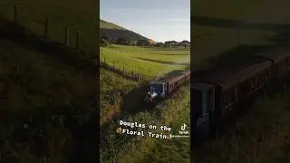 A train decorated in beautiful flowers is a lovely sight! #Talyllyn #SteamTrain #Railway