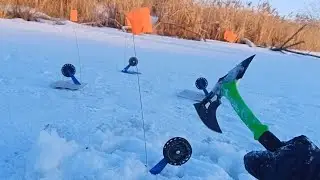 Pike are actively feeding in the dead of winter. Fishing with tip-ups.