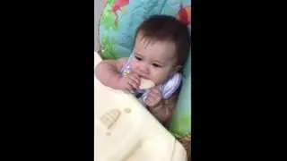 Zealyn eating mum mums for the first time