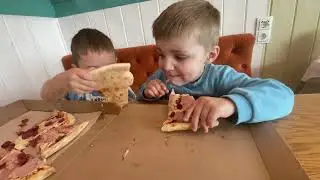 Demid eats pizza, rides a bike, walks with friends