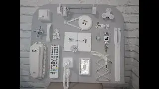 Бизиборд ручной работы с ТВ пультом
