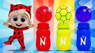 La bebé Niki juega con botellas de bebidas de colores | Canciones Para Niños