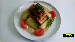 Oaks Crispy Skin Jerk Salmon in coconut lime sauce on sweet potato puree & Bok Choy