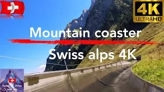 Mountain coaster in Switzerland, with the lift and fantastic views of the Swiss alps in 4K