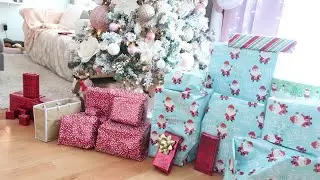 LOS NINOS abriendo regalos